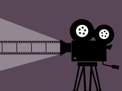 Grafik eines Filmprojektors in schwarz auf grauem Hintergrund.